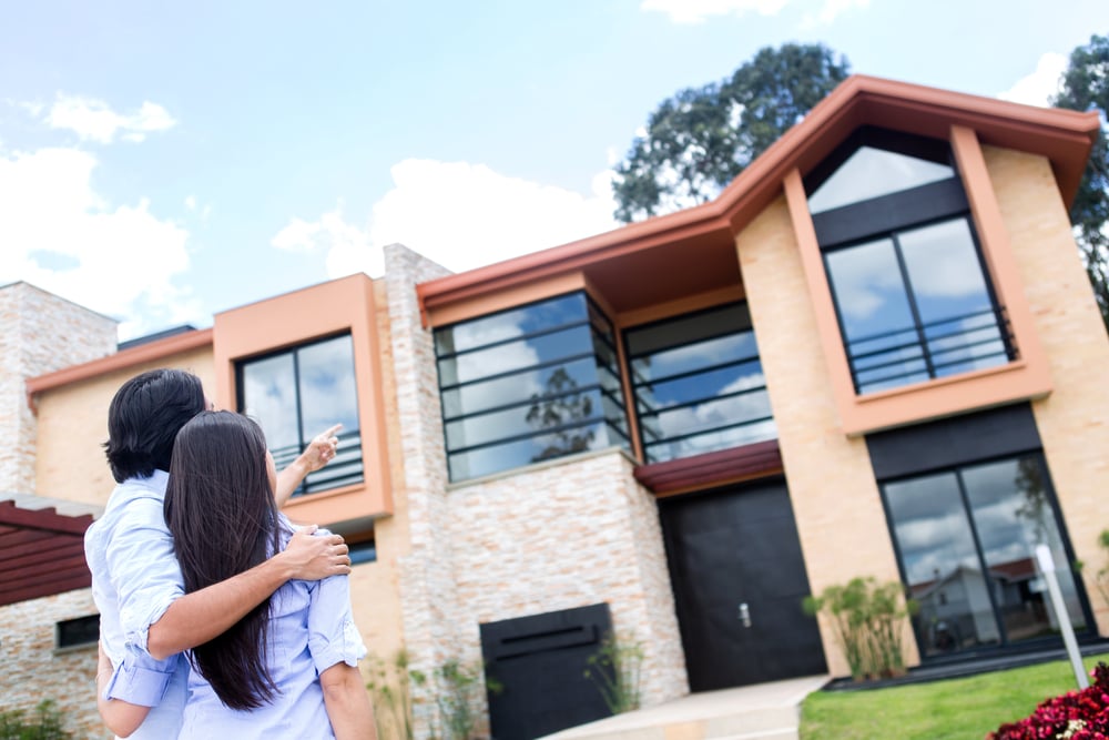 Couple looking at a beautiful house to buy-1